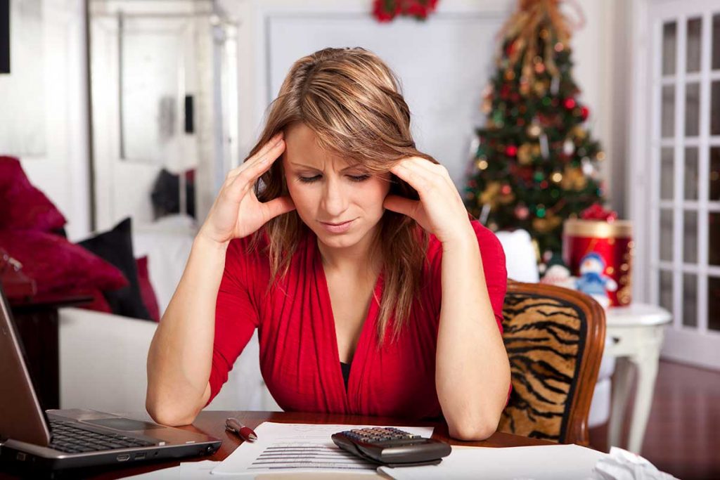 Woman stressed about holiday shopping